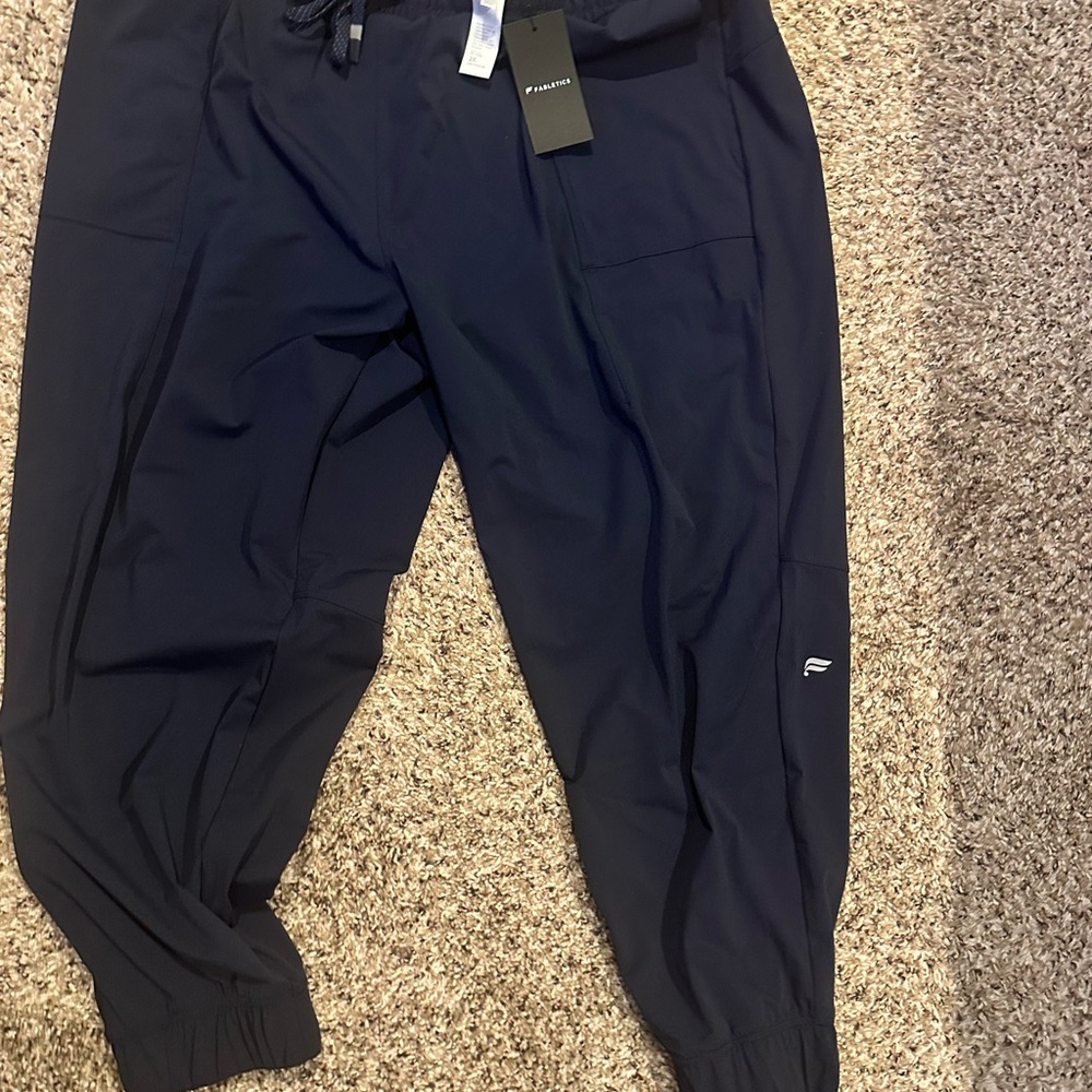Two pairs of 44 (2xl) men’s NWT fabletics pants 60$ retail each !!